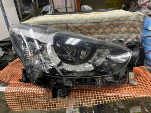 デミオDJ系　LED 純正右ヘッドライト 100-18373 D09K-51030