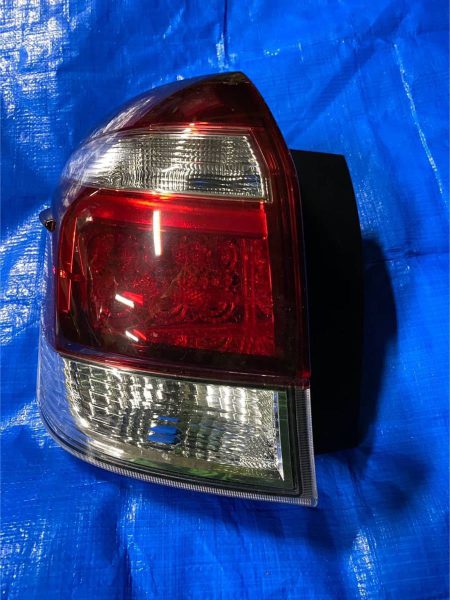 カローラフィールダー NZE161 純正左テールランプ 13-107